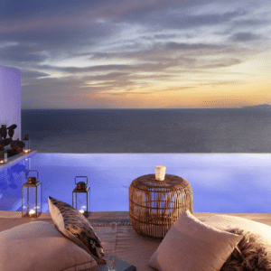 Experience serene sunset views and luxurious outdoor living at Santo Maris Oia with Natlaupa.