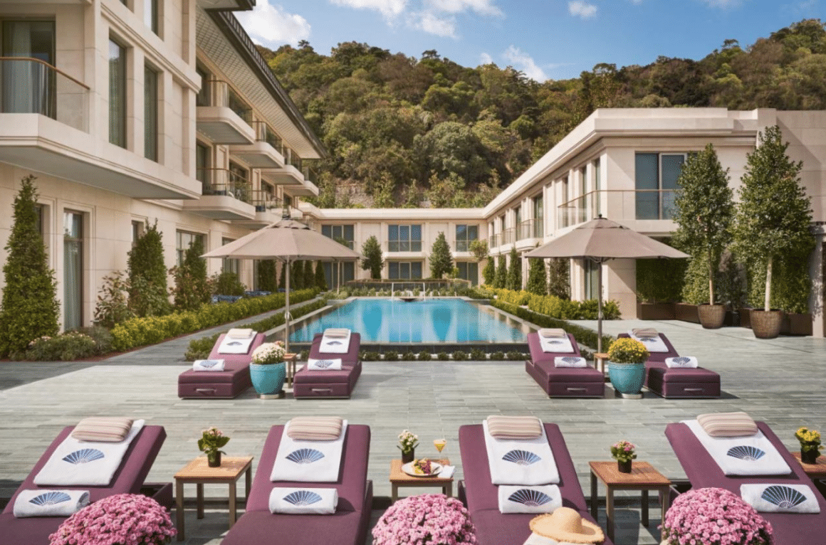 Relax by the serene poolside at Mandarin Oriental Bosphorus with Natlaupa, where luxury and nature converge in perfect harmony.