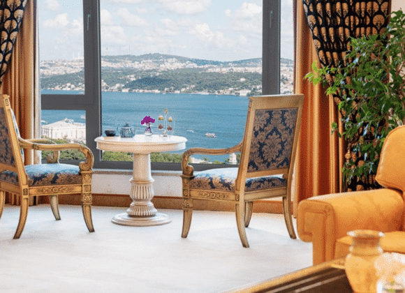 Luxurious seating area with Bosphorus view at Intercontinental Istanbul, available through Natlaupa.