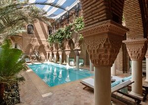 Experience the luxurious spa at La Sultana Marrakech, featuring traditional Moroccan architecture and serene ambiance, available with Natlaupa.